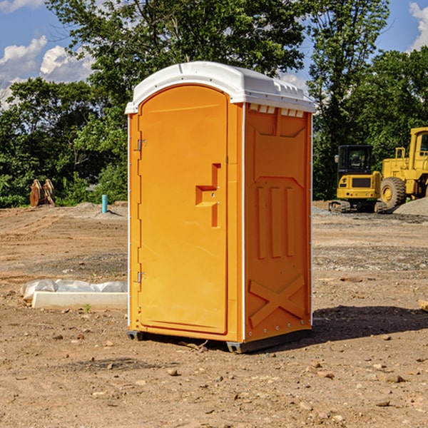 how often are the porta potties cleaned and serviced during a rental period in Hedrick IA